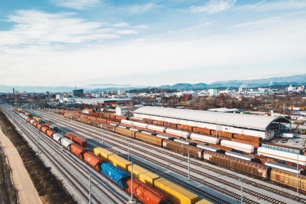 TRANSPORT KOLEJOWY colorful-cargo-trains-aerial-view-trains-standin-2025-01-29-03-58-19-utc