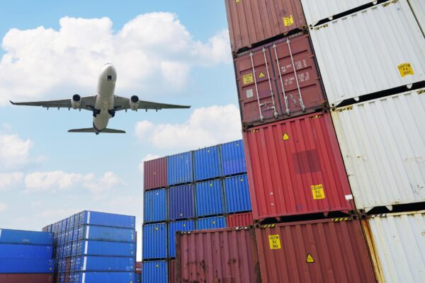 TRANSPORT LOTNICZY cargo-airplane-flying-above-logistic-container-ai-2025-01-29-04-39-52-utc